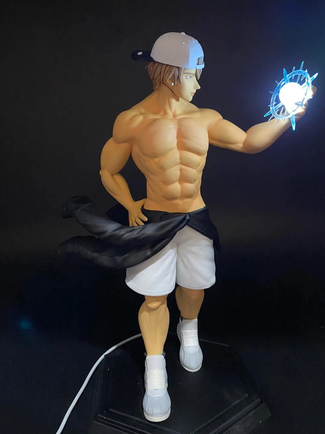 Urek Mazino from Tower of God, a hand-painted figure with a tattooed back